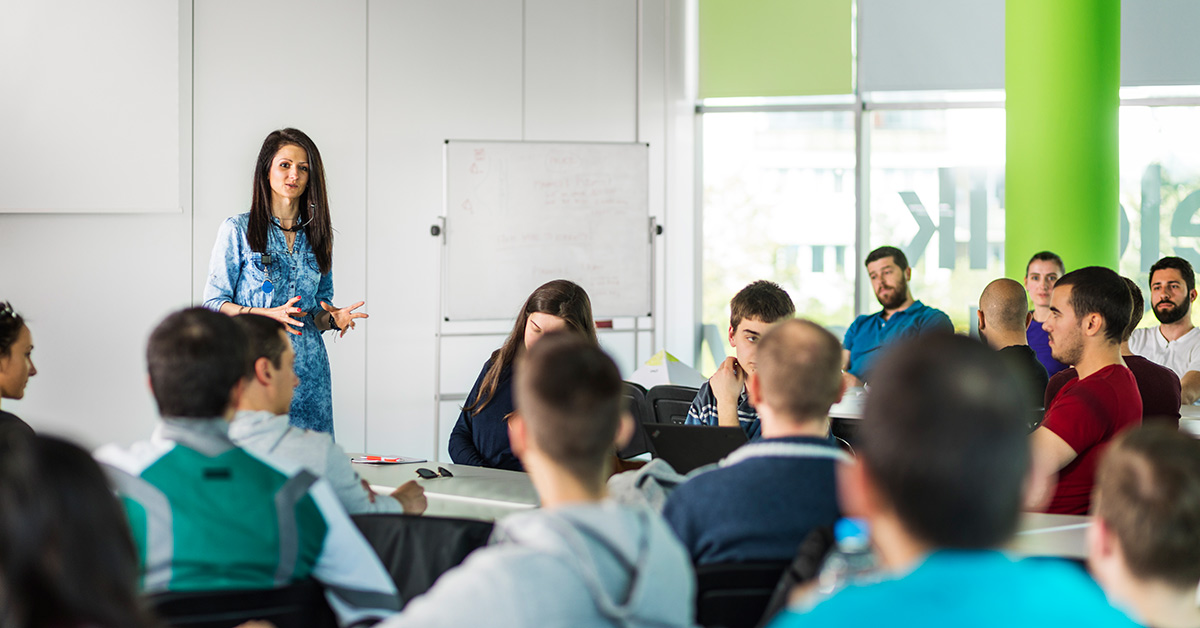 A soft skill trainer presenting in front of Telerik Academy students