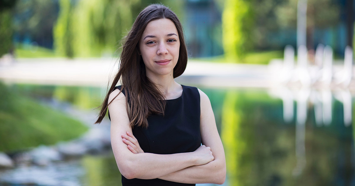 Picture of Kalina in front of pond in a park